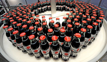 Workers at a Brampton, Ont., Coca-Cola bottling plant approved a new three-year deal by a vote of 83 per cent, ending a three-week strike. PHOTO Coca-Cola