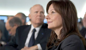 Mary Barra, seen here with former CEO Dan Akerson, started with GM as an engineering co-op student in 1980. PHOTO: General Motors Corp.