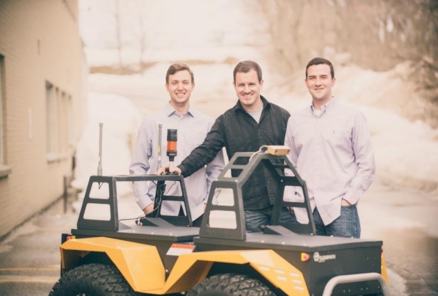 Cleathpath founders Bryan Webb, Ryan Gariepy and Matt Rendall with the Grizzly.  The company's Silverback will recast the company's automated technology into a bot capable of moving pallets as heavy as 3,000 kilograms. PHOTO ClearPath Robotics