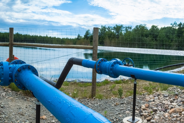 A holding pond for fracking water. Researchers say one application of the technology will be to clean water contaminated in the oil and gas extraction process. PHOTO: MIT
