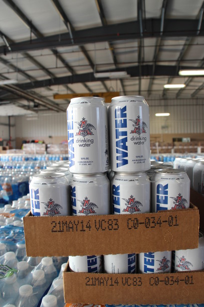 AB InBev is shipping more than 50,000 cans of water north in response to the Flint Water crisis. PHOTO: AB InBev