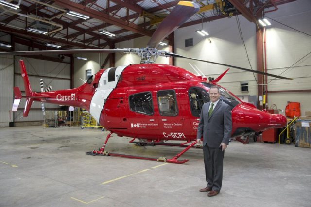 MP Darren Fisher on hand at the Canadian Coast Guard hanger where the last of the new light-lift helicopters was delivered. PHOTO: Fisheries and Oceans Canada 