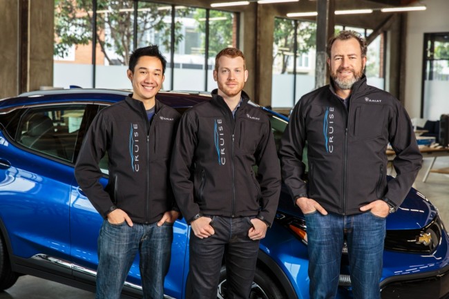 General Motors President Dan Ammann (right) with Cruise Automation co-founders Kyle Vogt (center) and Daniel Kan (left). PHOTO: General Motors