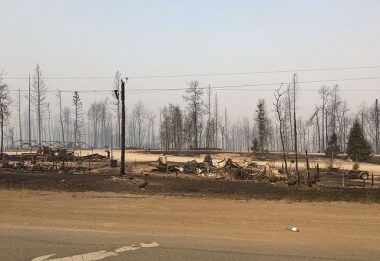 The wildfires left a trail of destruction as they tore through Fort McMurray last month, leaving some 2,400 buildings damaged or destroyed. PHOTO: jasonwoodhead23, via Flickr