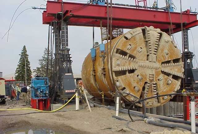 One of the large  tunnel boring machines being hoisted out of the western segment of the Eglinton Crosstown light rail transit route. PHOTO: CrosstownTO