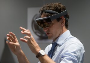 Prime Minister Justin Trudeau tries out Microsoft's HoloLens at the official opening of the Microsoft Canada Excellence Centre in Vancouver. PHOTO: Microsoft News Centre Staff